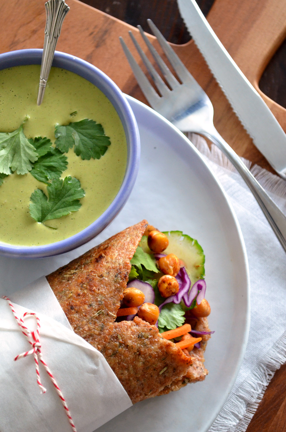 These Rainbow Chickpea Wraps are filled with deliciously spiced roasted chickpeas and wrapped in a warm, home-made flatbread with garlic and herbs. Simply delicious!