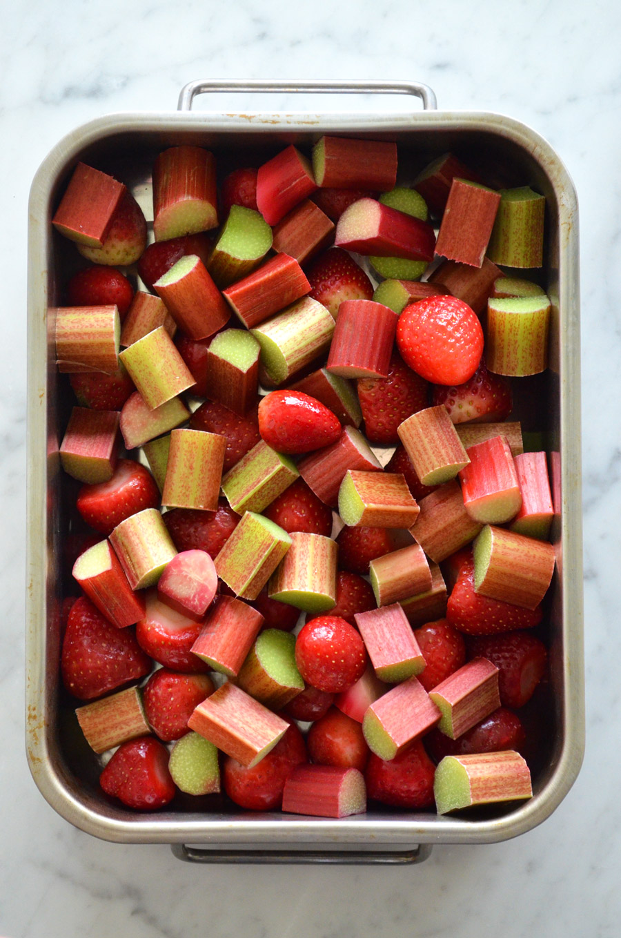 Dessert soup with rose, rhubarb and strawberries