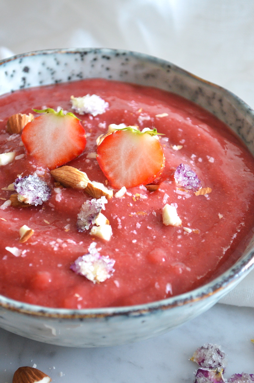Dessert soup with rose, rhubarb and strawberries