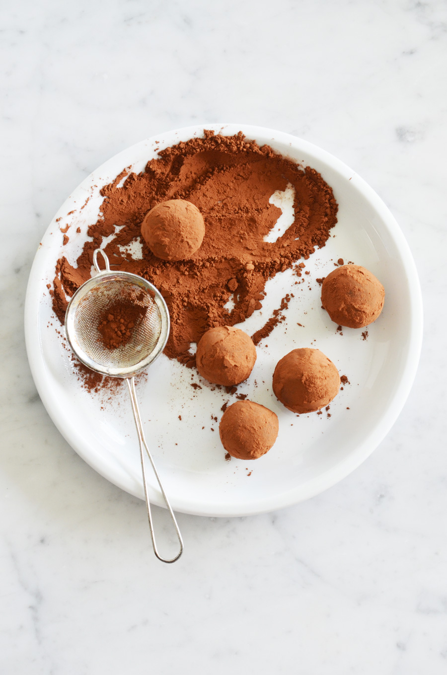 Three ingredient, whole food, healthier chocolate truffles by That Healthy Kitchen. Dairy free, gluten free and vegan too!