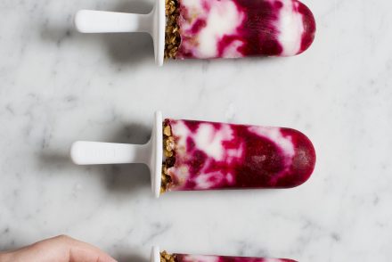 Breakfast popsicles with yoghurt, raspberries and granola via That Healthy Kitchen