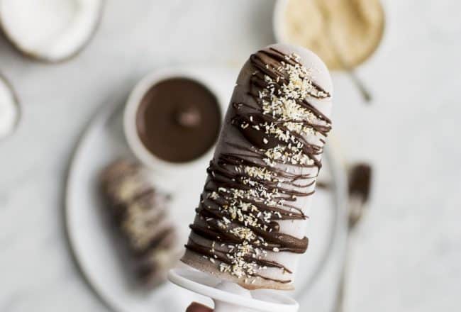 3-ingredient cacao coconut fudgy popsicles (aka fudgesicles) that are vegan, gluten-free, low sugar and above all, super delicious. Recipe via That Healthy Kitchen